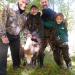 The Chief and P.D. showing P.D.'s sons how to display birds after a successful hunt